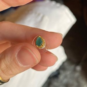 Pair of beautiful green earrings with diamond detailing on the sides